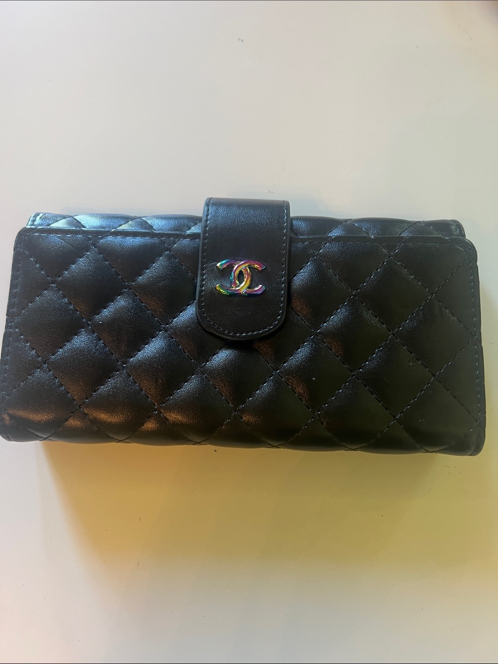 CHANEL Black Quilted Leather Wallet with Iridescent CC Accent